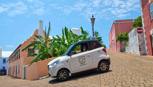 A microcar is driving around St. George's