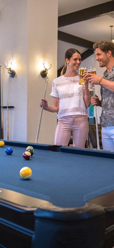 Boundary Sports Bar and Grille – Couple Playing Pool At Boundary