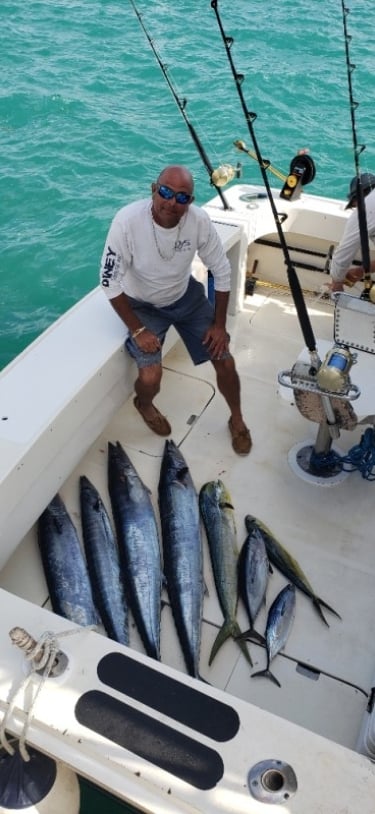 Atlantic Spray Charters – Captain With Fish