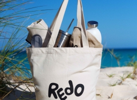 ReDo Bermuda Sustainable cloth bag with sustainable items.