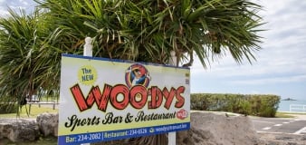 Woodys sports bar & restaurant sign