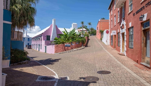 A view of St George's colourful Water Street with bright coloured houses.