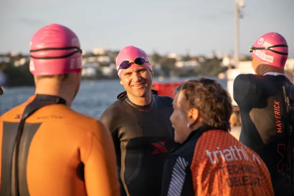 Two swimmers conversing after a race in Bermuda