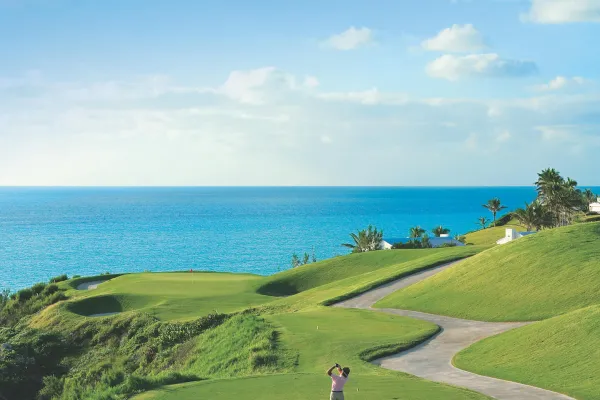 A tee shot on an oceanside hole at a Bermuda golf course