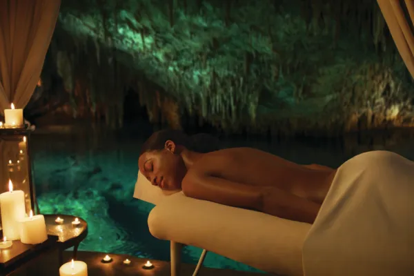 A woman receiving a massage at Natura Spa