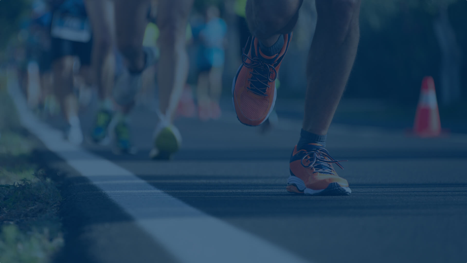 Closeup of runners' shoes during a race
