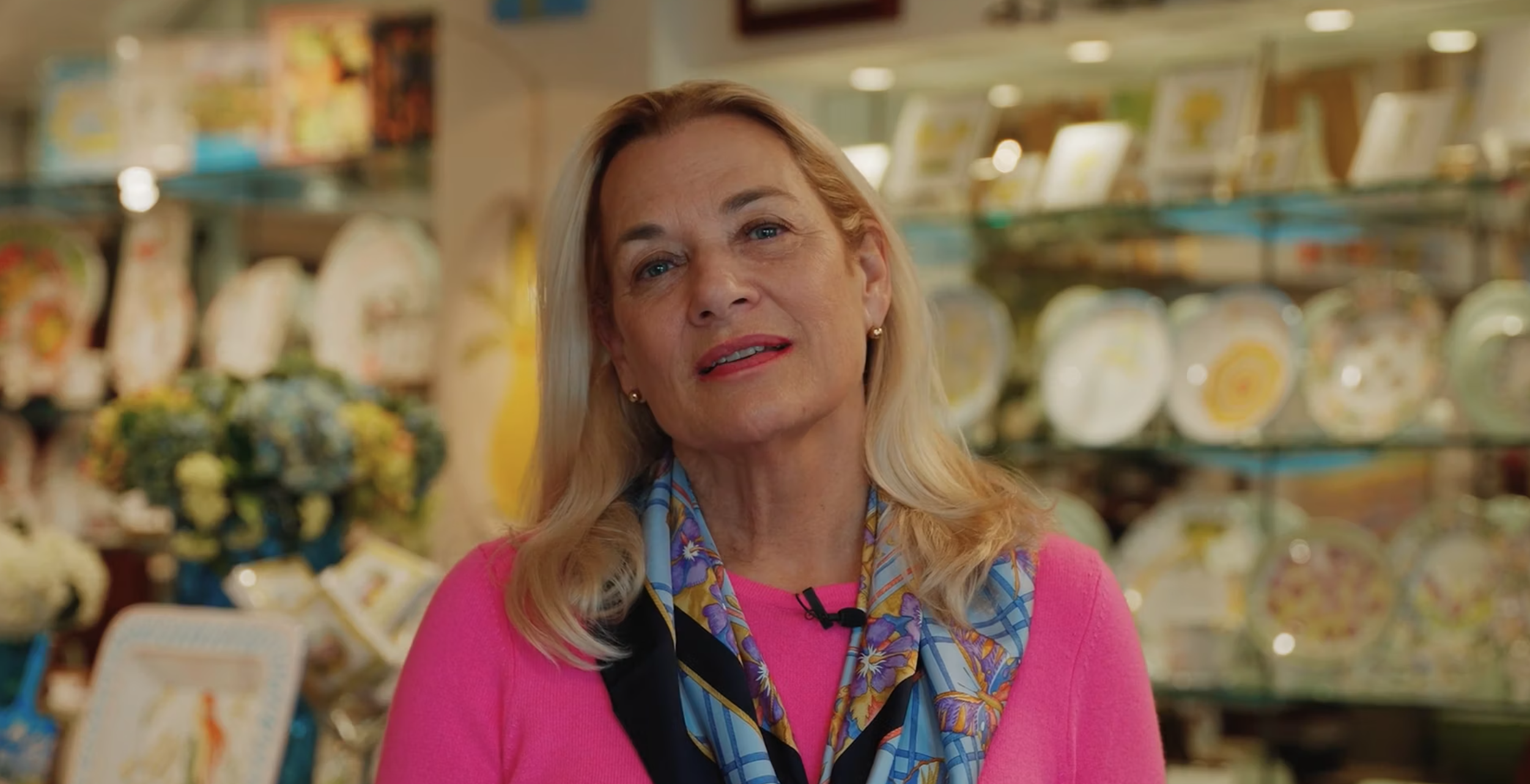 A woman is talking to the camera.