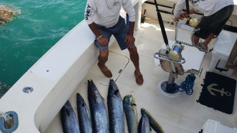 Atlantic Spray Charters – Captain With Fish