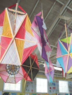 Kites hanging from the rafters 