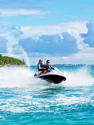 2 people on a jet ski in the ocean