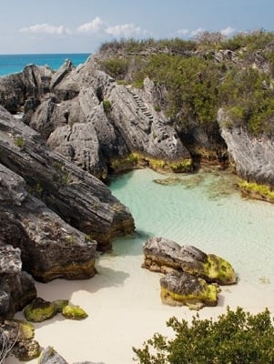 aerial view of large rocks on beach