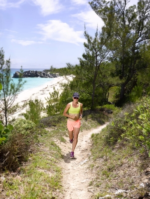 Flora Duffy running on a trail