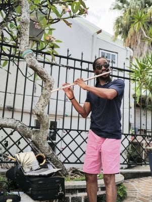 A man performing on his flute in Bermuda