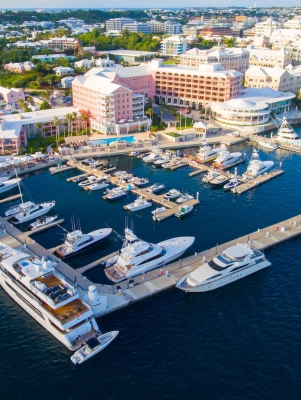 aerial image of the a marina filled with yachts and sail boats