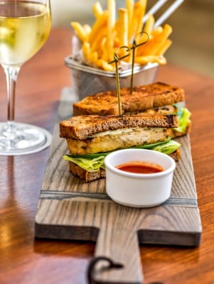 Close up of a sandwhich and fries.
