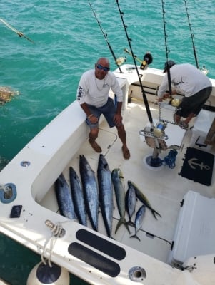 Atlantic Spray Charters – Captain With Fish