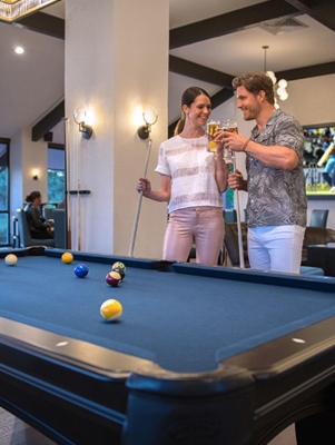 Boundary Sports Bar and Grille – Couple Playing Pool At Boundary