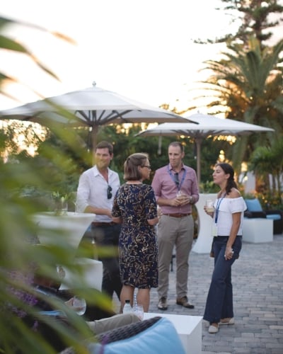 Exterior view of people enjoying the gardens at Rosedon.