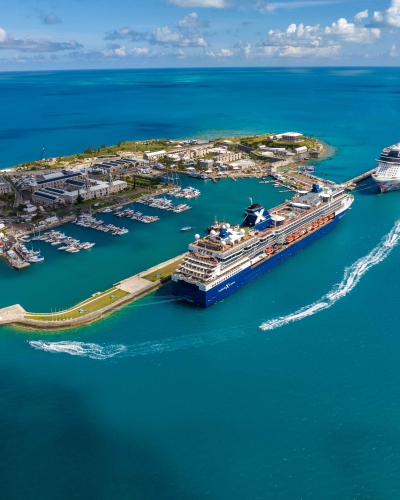 Aerial of cruise ships docked in Dockyard.