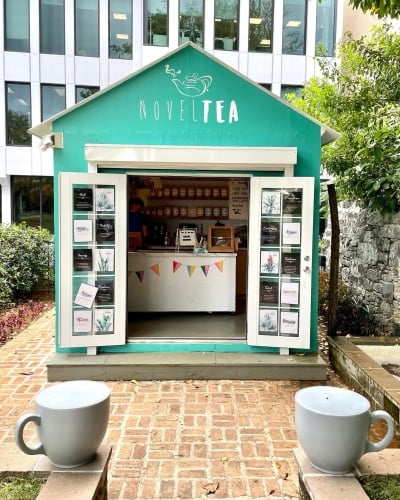 A small tea shop in a park. 