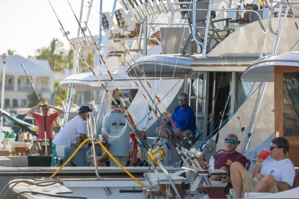 Men sitting on fishing boats