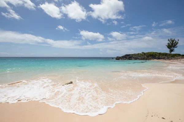 Tide coming in over the sand