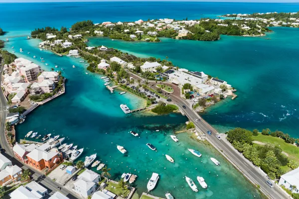 Aerial view of a strip of road near a marina in Bermuda