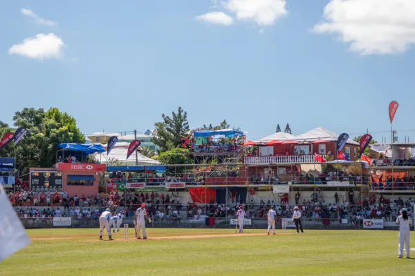 Bermuda's cup match game, a cricket match in a stadium attended by hundreds of spectators