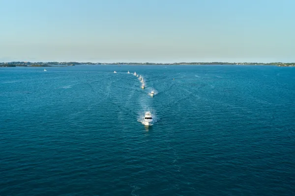 A line of yachts sail in Bermuda
