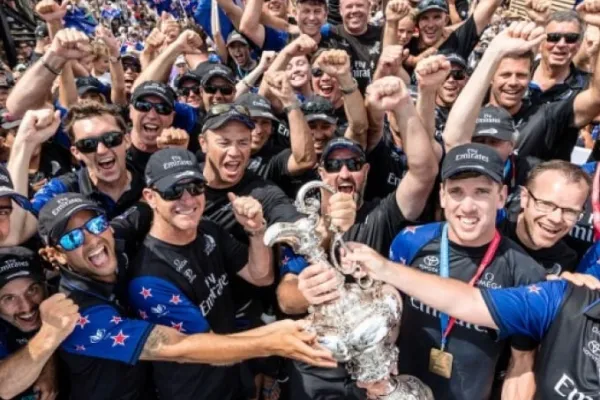 The America's cup winners celebrate with their trophy
