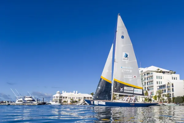 A sailboat sailing across a harbour in Bermuda