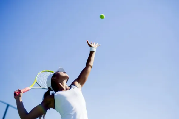 A woman prepares to serve in Bermuda