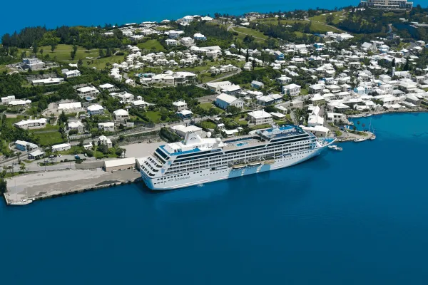 A cruise ship anchored at Pennos Wharf in St. George's