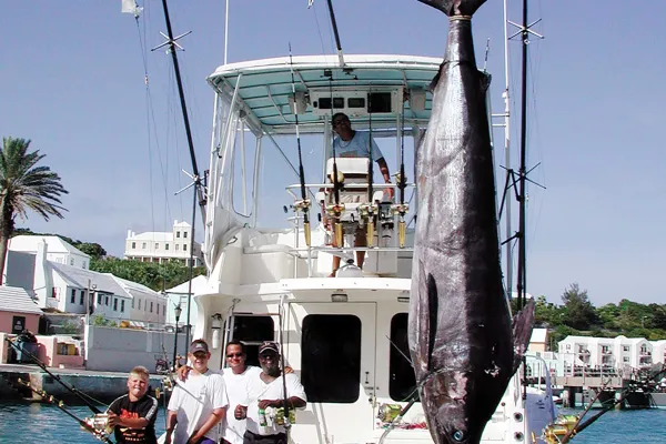 A fishing boat called Tenacious in a Bermuda harbour