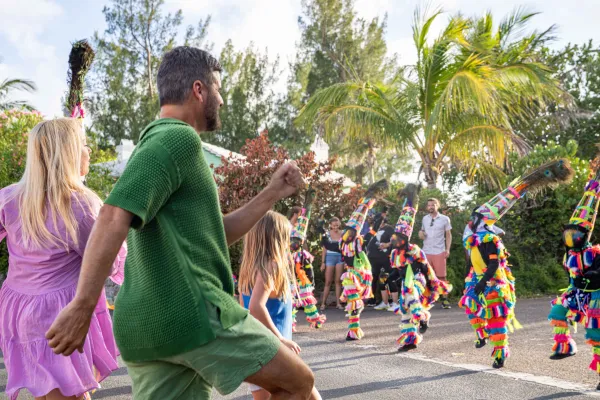 A family dancing with Gombeys