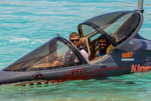 Two people in an aquatic vehicle in the Bermuda waters