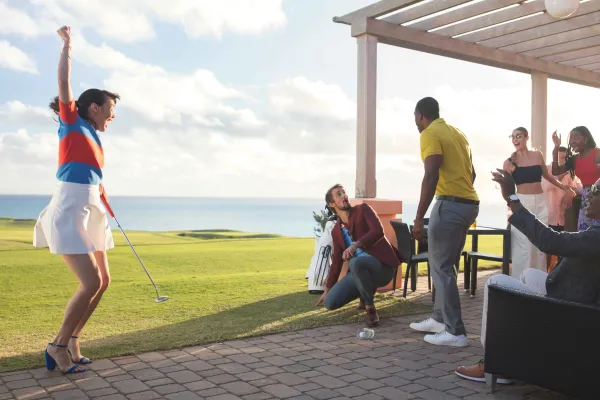 A group of friends are playing golf games.