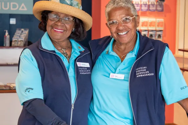 Two smiling women in the Bermuda hospitality industry