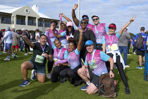 Runners celebrating after completing the Bermuda Triangle Challenge
