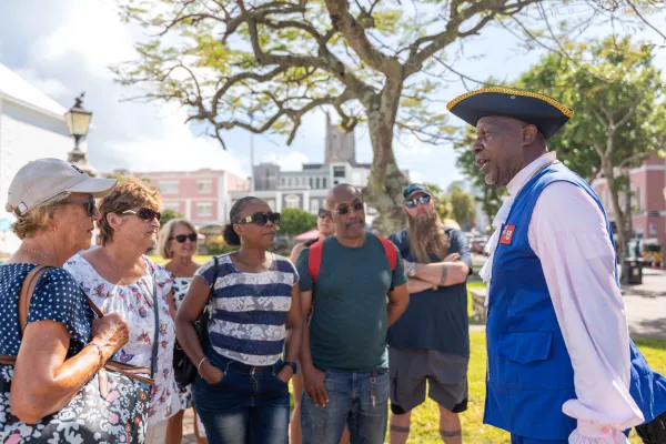 Town Crier is giving a tour outside of City Hall