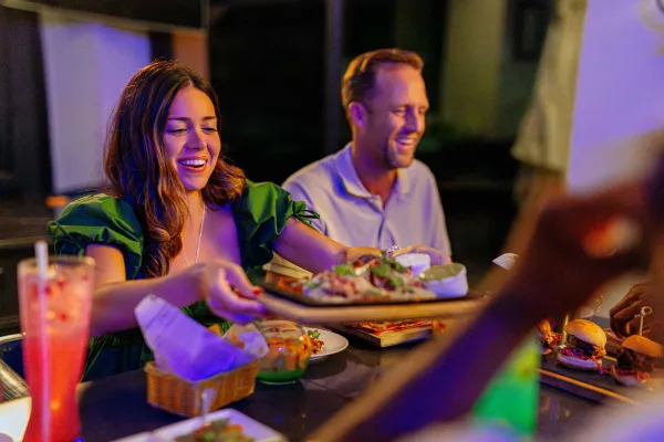 Two people enjoying a meal at a Bermuda restaurant