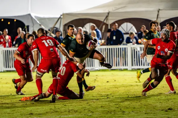 A rugby player gets tackled at the Bermuda Rugby Classic