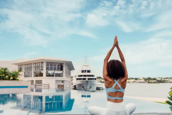 A woman is doing a yoga pose