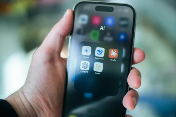 A close up of an apple iphone with artificial intelligence aps. 