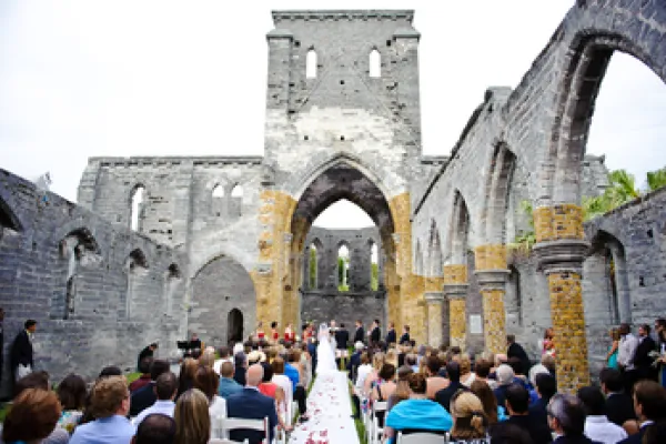 A wedding ceremony in an unfinished church 