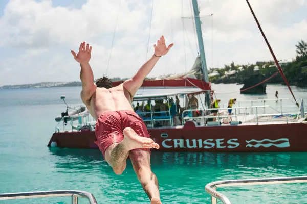 A man is diving into the water. 