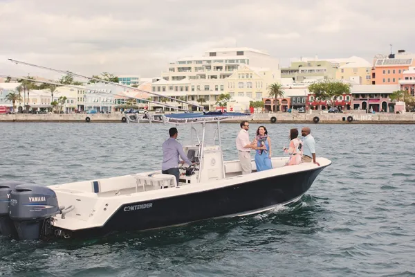 Group of people on a boat driving