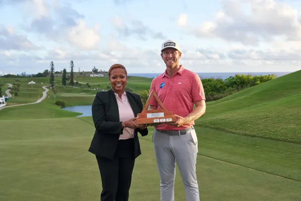 BTA CEO with winner of Butterfield Bermuda Championship 2022.