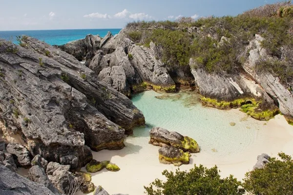 aerial view of large rocks on beach