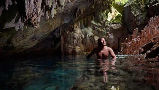 man in a beautiful cave